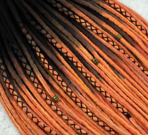 Pumpkin ombre wool dreads with black roots